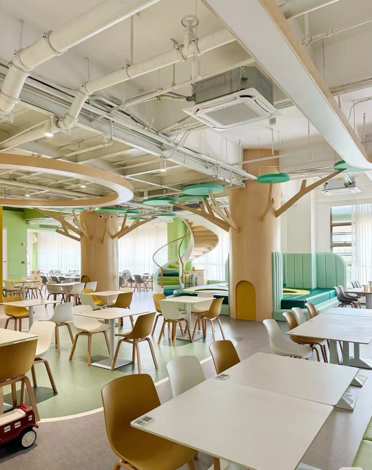 Green color forest style Play Cafe Area