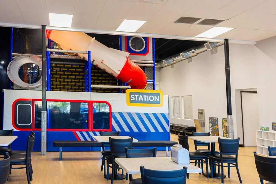 Pretend play supports play café business Indoor play area with slide
