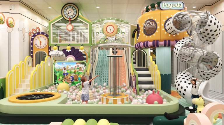 Colorful indoor playground with slides.