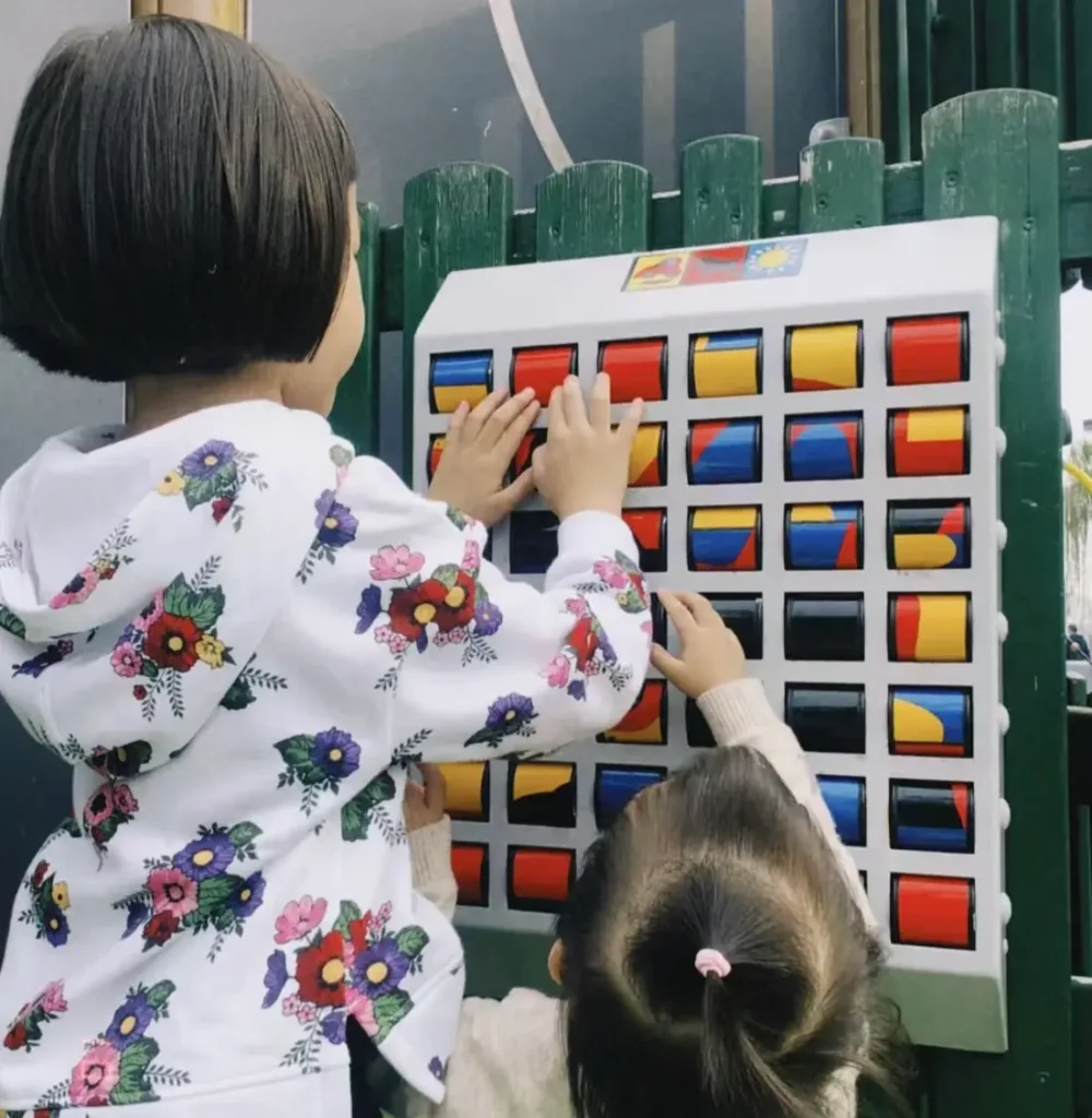 Children playing with colorful Toddler Play Panels